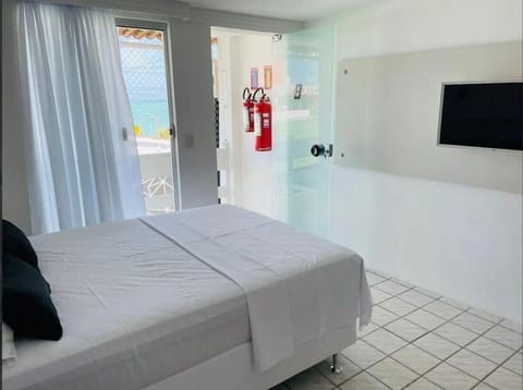 Standard Twin Room, 1 Double Bed, Private Bathroom, Beachfront | Laptop workspace, blackout drapes, iron/ironing board, free WiFi