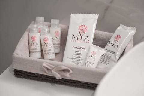 Shower, hair dryer, slippers, towels