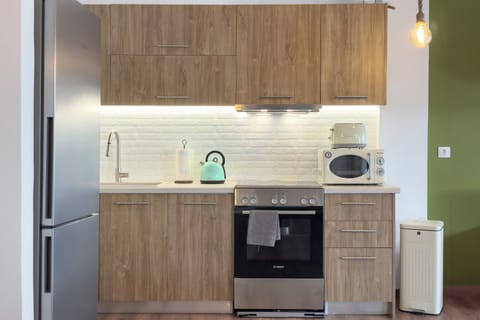 Deluxe Apartment, City View | Private kitchen | Espresso maker, electric kettle