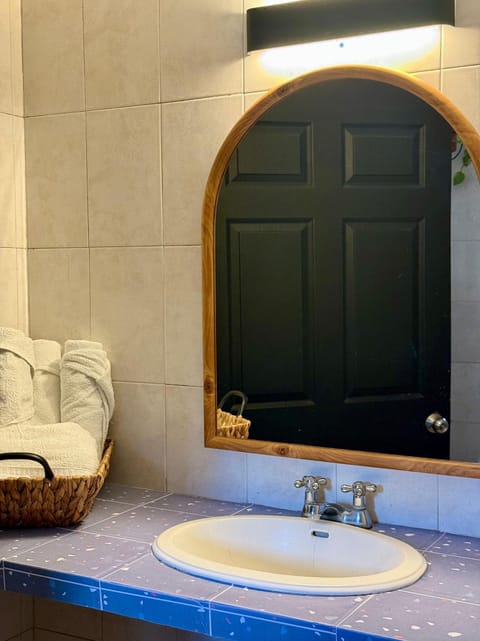 Standard Double Room | Bathroom | Shower, towels, soap, shampoo