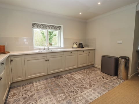 Fridge, dishwasher, electric kettle, cookware/dishes/utensils