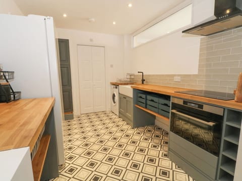 Fridge, electric kettle, toaster, cookware/dishes/utensils