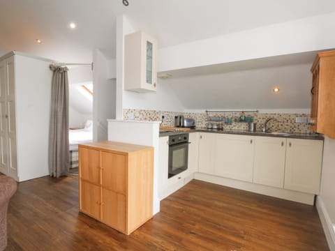 Fridge, electric kettle, toaster, cookware/dishes/utensils