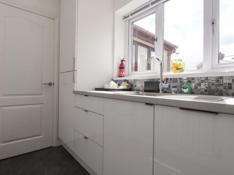 Fridge, dishwasher, electric kettle, toaster