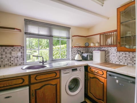 Fridge, electric kettle, toaster, cookware/dishes/utensils