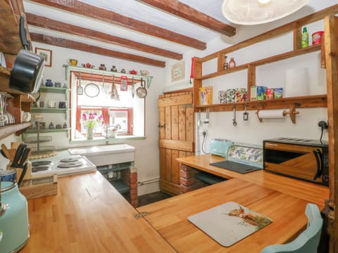 Fridge, electric kettle, toaster, cookware/dishes/utensils