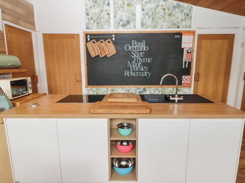 Fridge, electric kettle, toaster, cookware/dishes/utensils