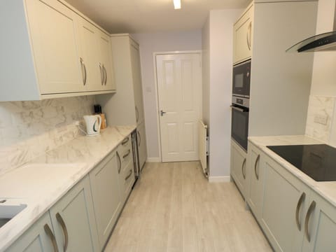 Fridge, dishwasher, electric kettle, cookware/dishes/utensils