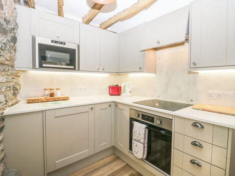 Fridge, electric kettle, cookware/dishes/utensils