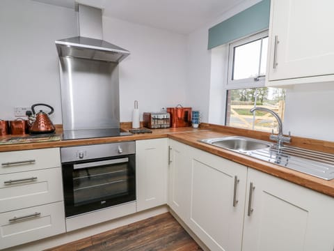 Fridge, electric kettle, toaster, cookware/dishes/utensils