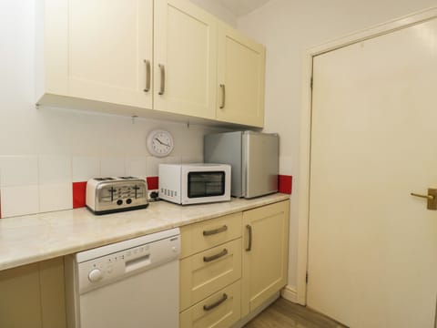 Fridge, dishwasher, electric kettle, cookware/dishes/utensils