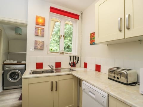 Fridge, dishwasher, electric kettle, cookware/dishes/utensils