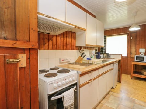 Fridge, electric kettle, toaster, cookware/dishes/utensils