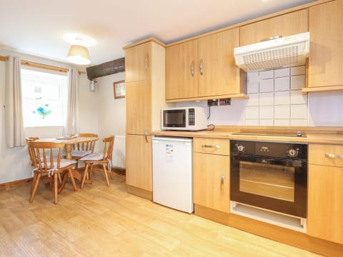 Fridge, electric kettle, toaster, cookware/dishes/utensils