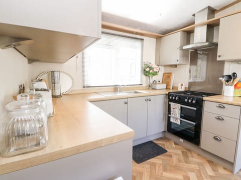 Fridge, electric kettle, toaster, cookware/dishes/utensils