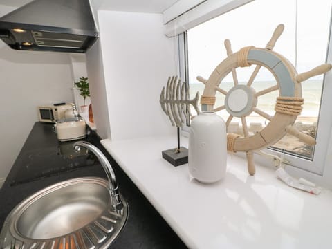 Fridge, electric kettle, toaster, cookware/dishes/utensils