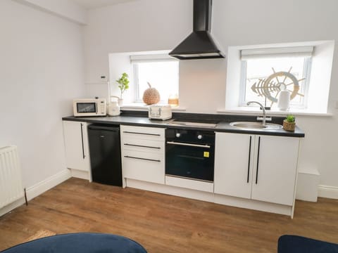 Fridge, electric kettle, toaster, cookware/dishes/utensils