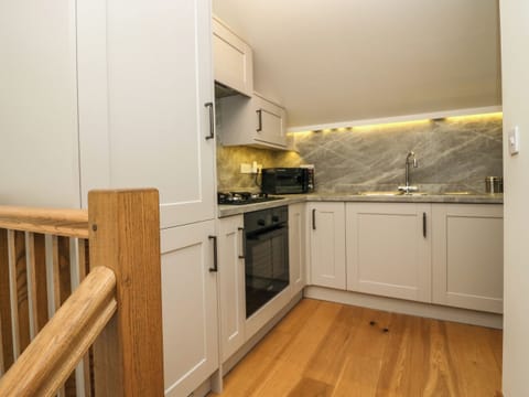 Fridge, electric kettle, toaster, cookware/dishes/utensils