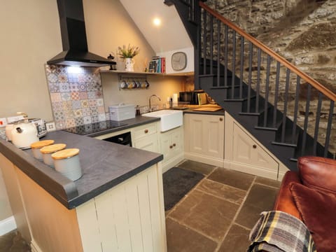 Fridge, electric kettle, toaster, cookware/dishes/utensils