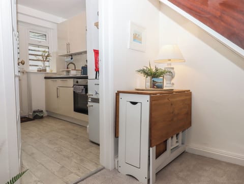 Fridge, electric kettle, toaster, cookware/dishes/utensils