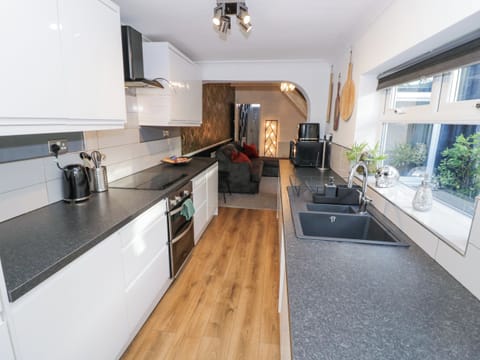 Fridge, electric kettle, toaster, cookware/dishes/utensils