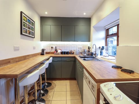 Fridge, electric kettle, toaster, cookware/dishes/utensils