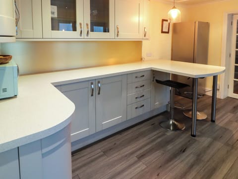 Fridge, electric kettle, toaster, cookware/dishes/utensils