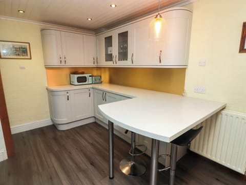 Fridge, electric kettle, toaster, cookware/dishes/utensils