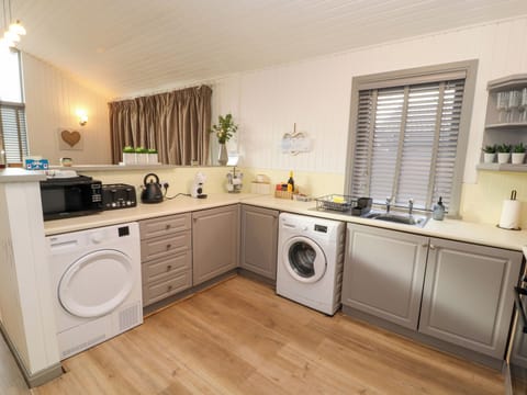 Fridge, electric kettle, toaster, cookware/dishes/utensils