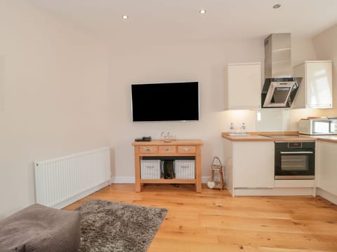 Fridge, electric kettle, toaster, cookware/dishes/utensils