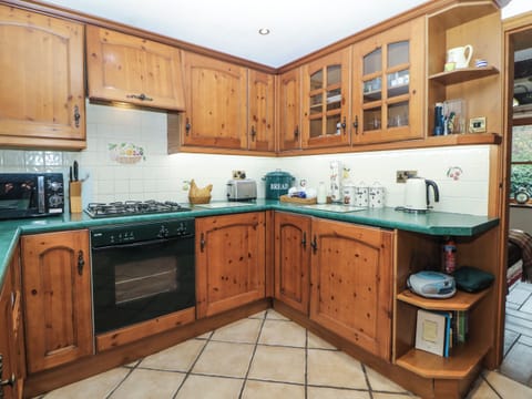 Fridge, electric kettle, toaster, cookware/dishes/utensils