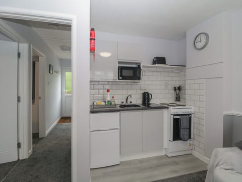 Fridge, electric kettle, toaster, cookware/dishes/utensils