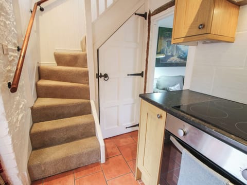 Fridge, electric kettle, cookware/dishes/utensils