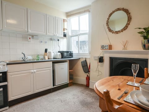 Fridge, electric kettle, toaster, cookware/dishes/utensils