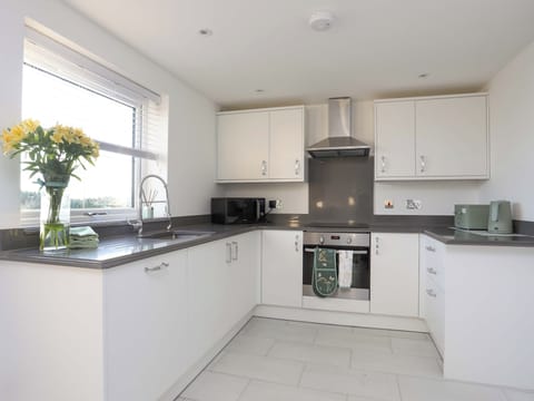 Fridge, electric kettle, toaster, cookware/dishes/utensils