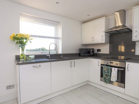 Fridge, electric kettle, toaster, cookware/dishes/utensils