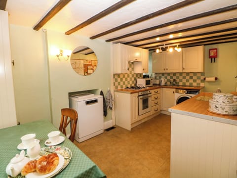 Fridge, electric kettle, toaster, cookware/dishes/utensils