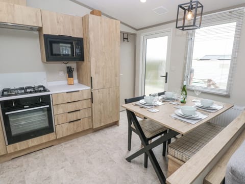 Fridge, electric kettle, toaster, cookware/dishes/utensils