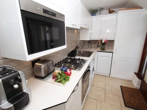 Fridge, dishwasher, electric kettle, cookware/dishes/utensils