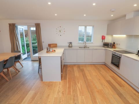 Fridge, electric kettle, toaster, cookware/dishes/utensils