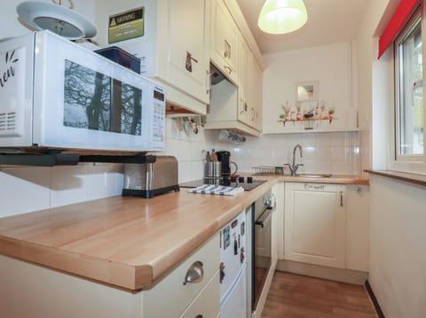 Fridge, electric kettle, toaster, cookware/dishes/utensils