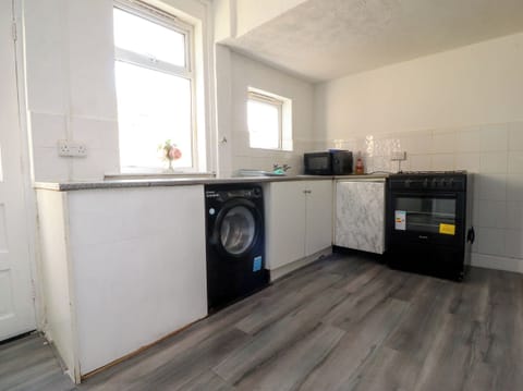 Fridge, electric kettle, toaster, cookware/dishes/utensils