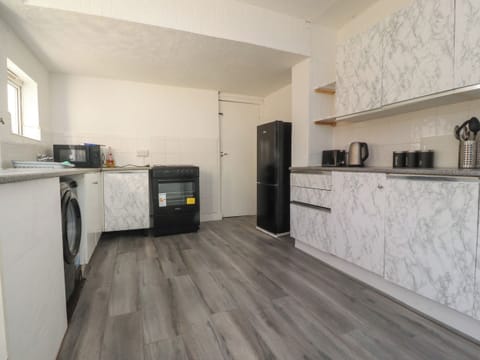 Fridge, electric kettle, toaster, cookware/dishes/utensils