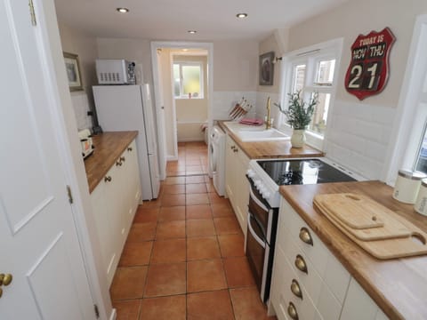 Fridge, electric kettle, toaster, cookware/dishes/utensils