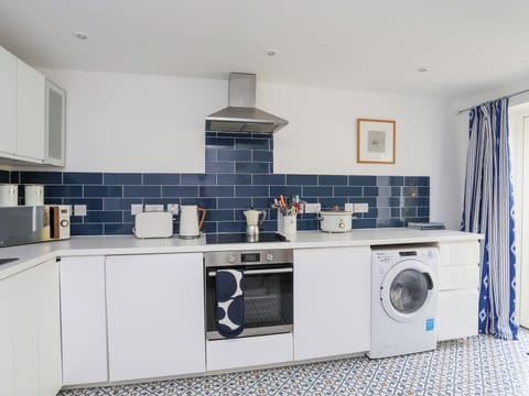 Fridge, electric kettle, toaster, cookware/dishes/utensils