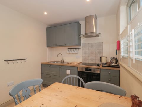 Fridge, electric kettle, toaster, cookware/dishes/utensils