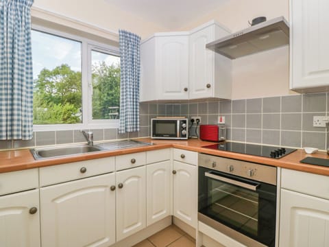 Fridge, electric kettle, toaster, cookware/dishes/utensils