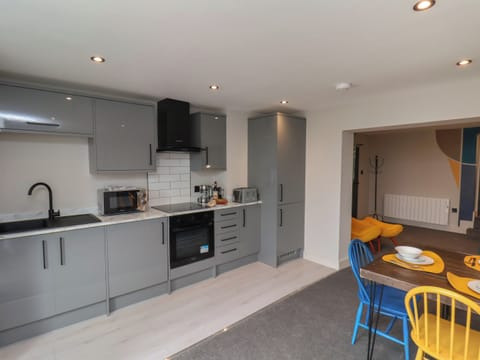 Fridge, electric kettle, toaster, cookware/dishes/utensils