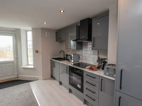 Fridge, electric kettle, toaster, cookware/dishes/utensils