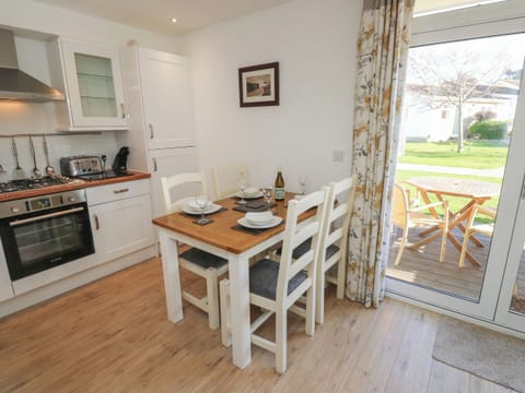 Fridge, electric kettle, toaster, cookware/dishes/utensils